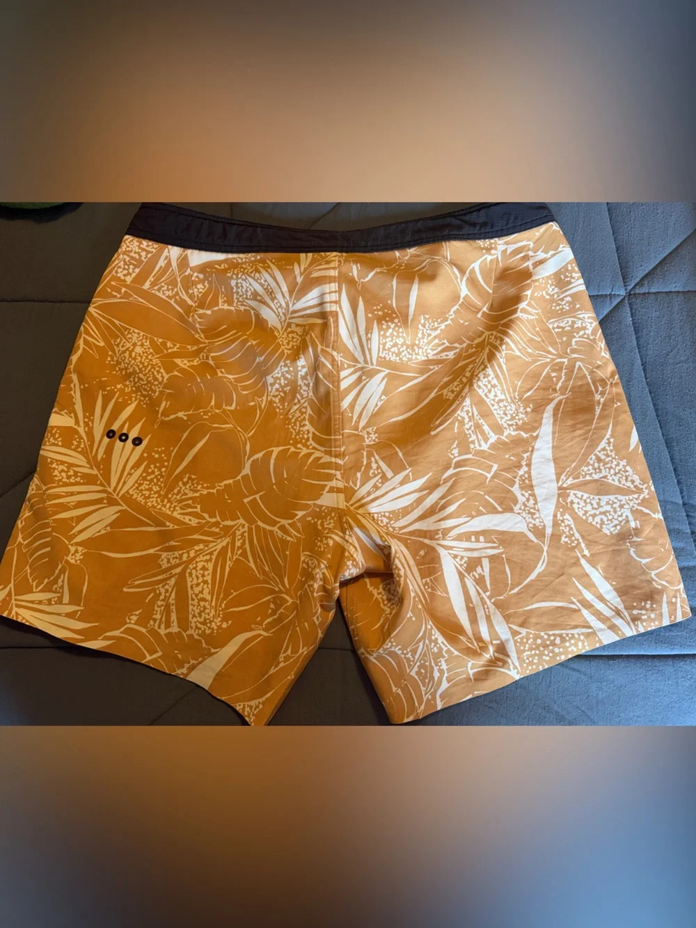Vuori Board Swim Shorts (Black with light brown floral patterns)